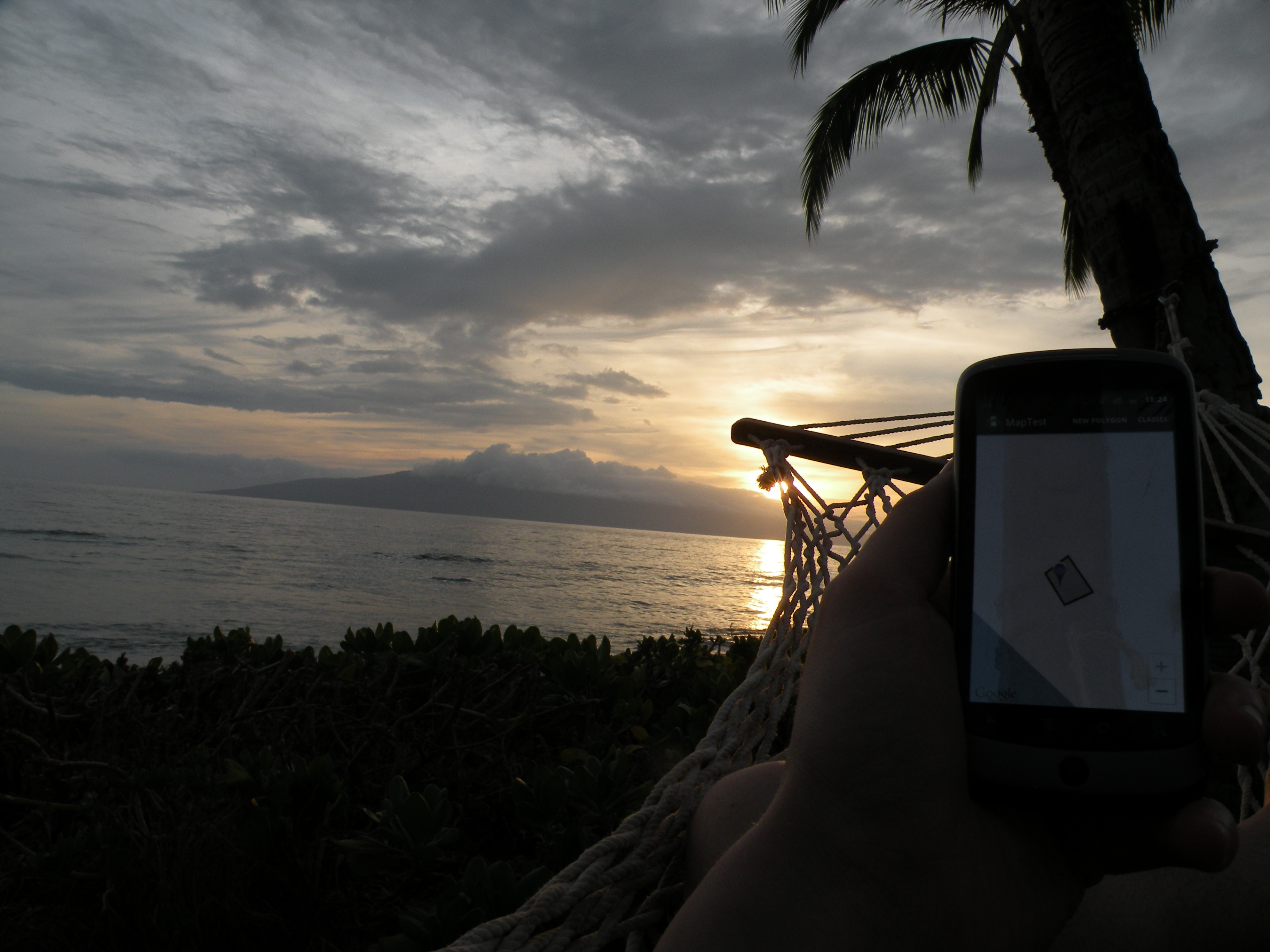 Demo from hammock of geofencing on Android with sunset int he background.