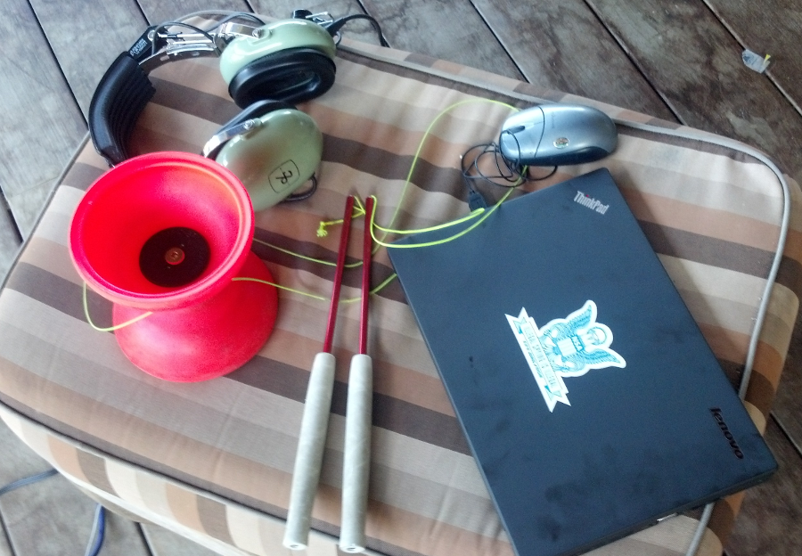A laptop, headset, and diabolo.